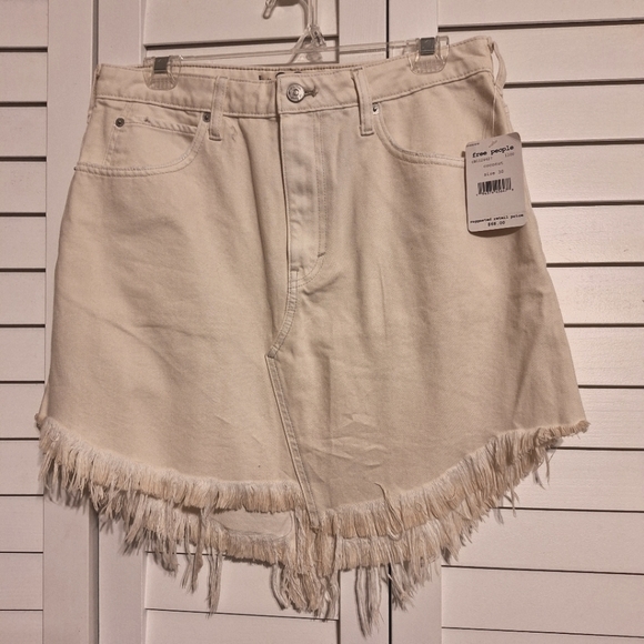 We The Free Dresses & Skirts - We the free Free People off-white denim skirt Sz 30 fringe hem NWT